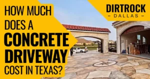 Stamped concrete driveway with flagstone pattern and decorative star medallion in front of a stone home in the Dallas-Fort Worth area