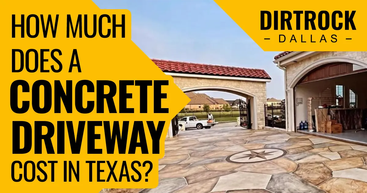 Stamped concrete driveway with flagstone pattern and decorative star medallion in front of a stone home in the Dallas-Fort Worth area